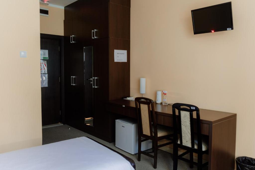 TV a/nebo společenská místnost v ubytování Hotel Drinska lasta