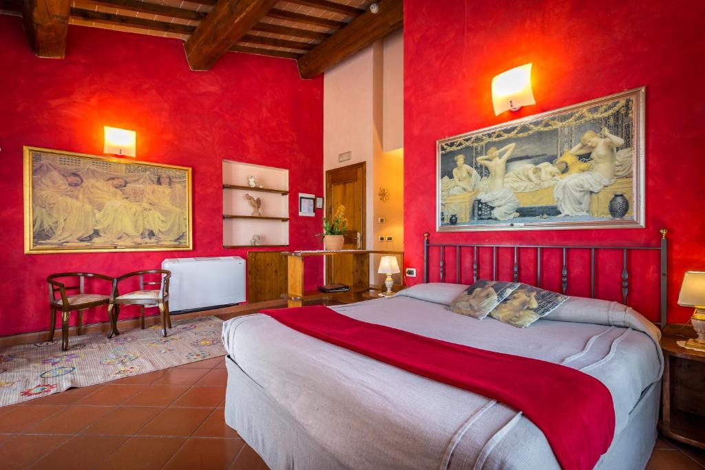 Postel nebo postele na pokoji v ubytování Il Borgo di Villa Castelletti Country Hotel