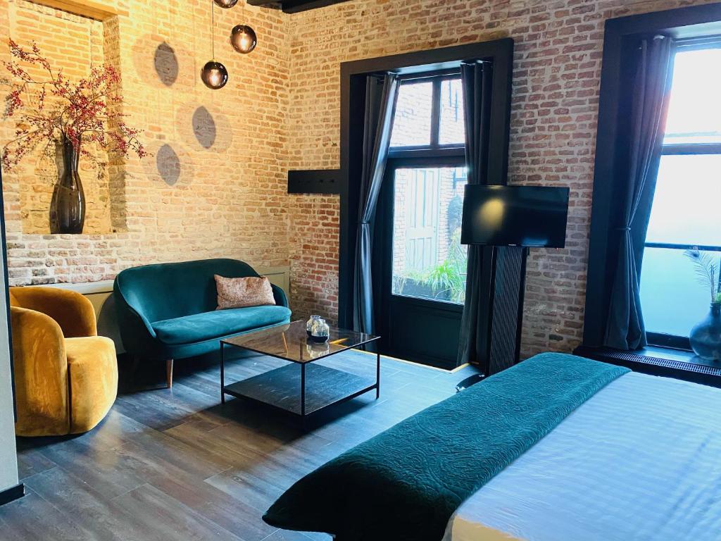 Postel nebo postele na pokoji v ubytování Hotel de Prince