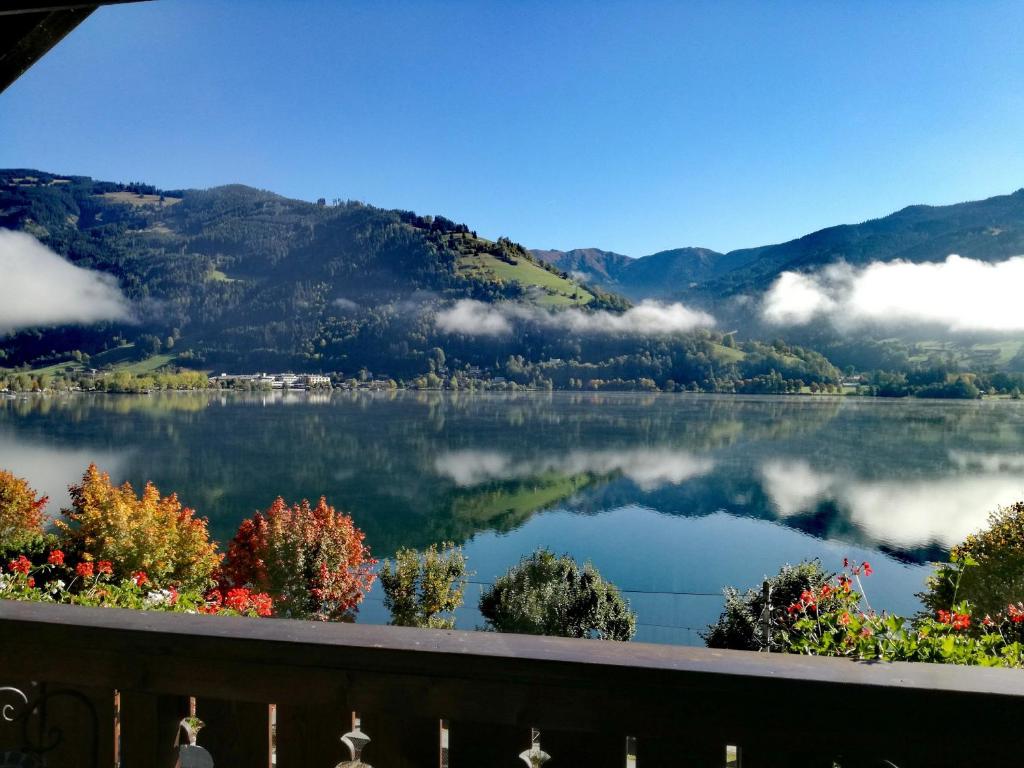 a view of a lake with mountains in the background at Haus Ditzer - Villa Theresia in Zell am See