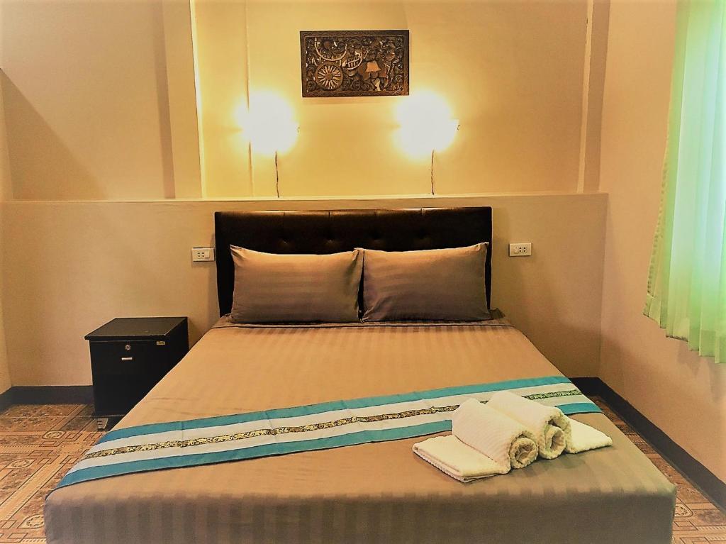 Postel nebo postele na pokoji v ubytování EiDI Homestay