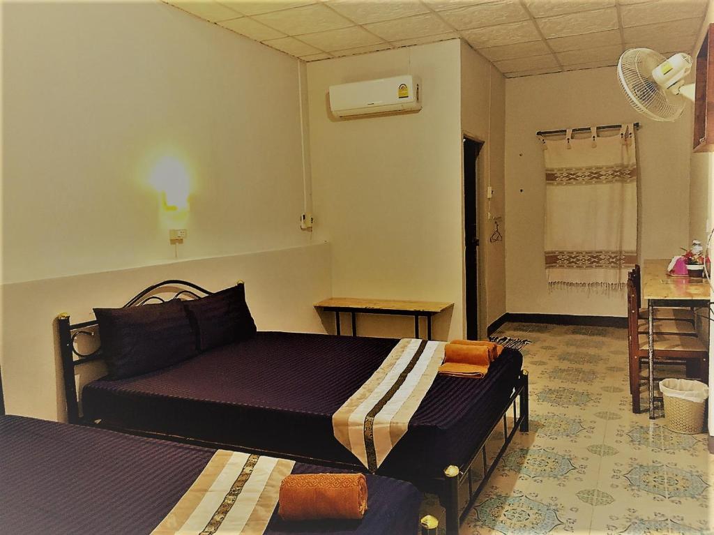 Postel nebo postele na pokoji v ubytování EiDI Homestay