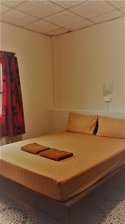 Postel nebo postele na pokoji v ubytování EiDI Homestay