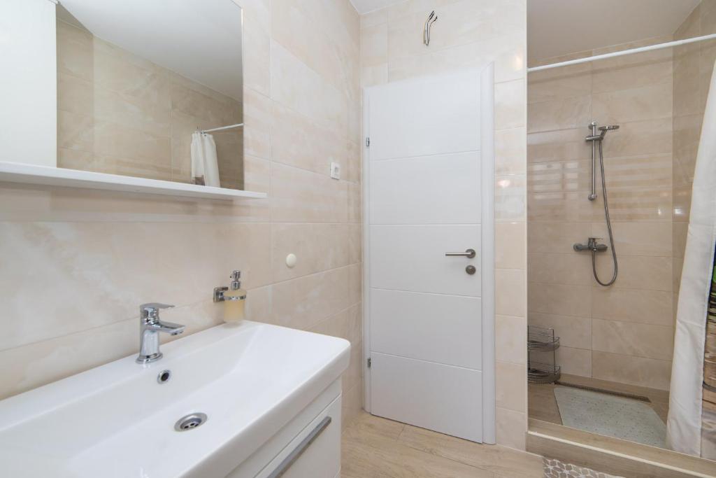 Kúpeľňa v ubytovaní Apartments Crystal