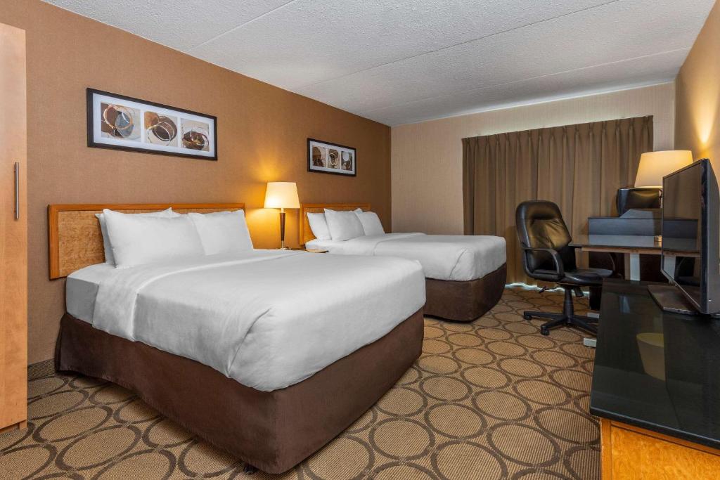 Krevet ili kreveti u jedinici u okviru objekta Comfort Inn Chicoutimi