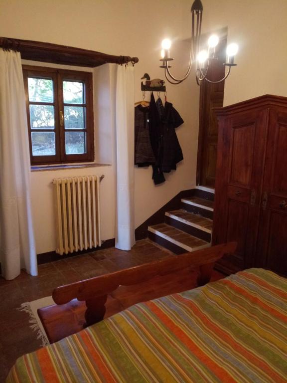 Łóżko lub łóżka w pokoju w obiekcie Le Querciolaie Monte Cavallo - entire house