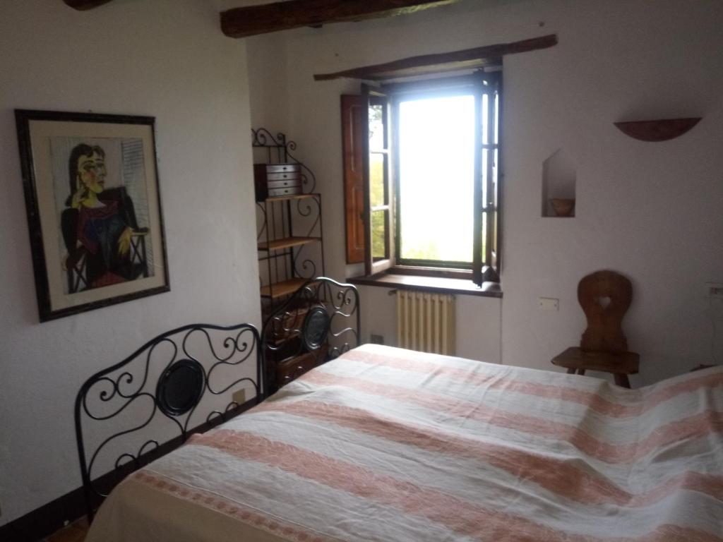 Łóżko lub łóżka w pokoju w obiekcie Le Querciolaie Monte Cavallo - entire house