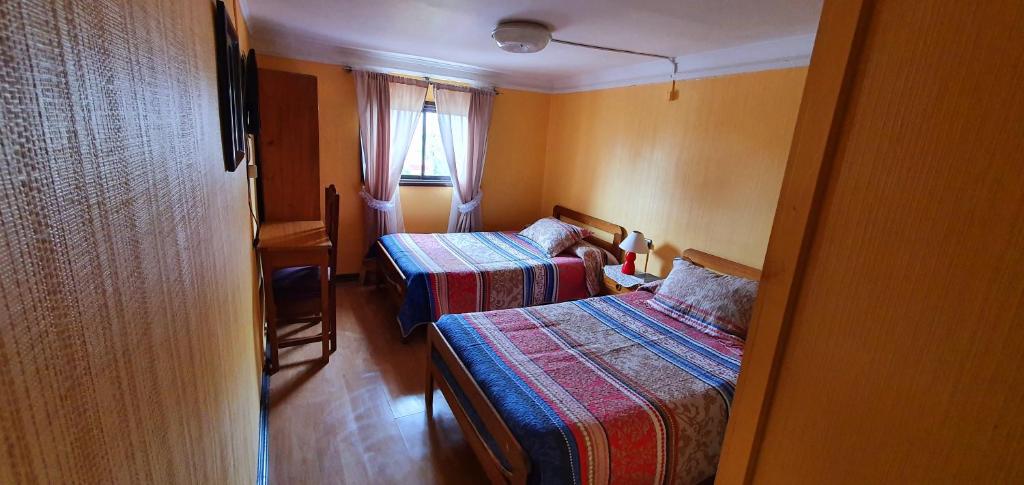 Postel nebo postele na pokoji v ubytování Hotel Iberia