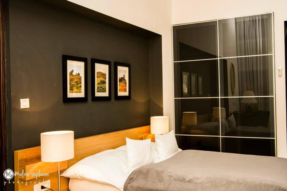 Postel nebo postele na pokoji v ubytování Ivana Hotel