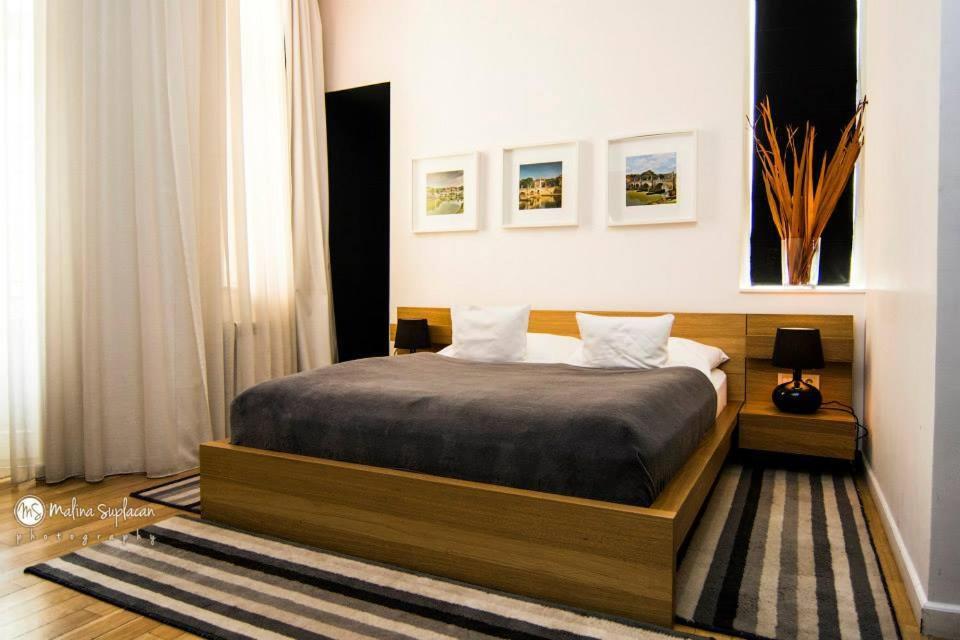 Postel nebo postele na pokoji v ubytování Ivana Hotel