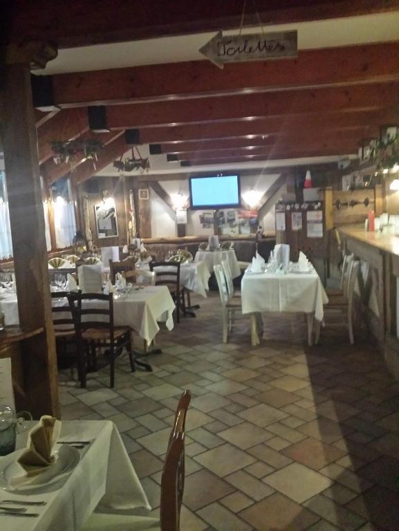 Restaurace v ubytování Residence Lores 2 - Go Vacanze
