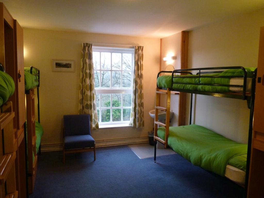 Postel nebo postele na pokoji v ubytování Ingleton Hostel