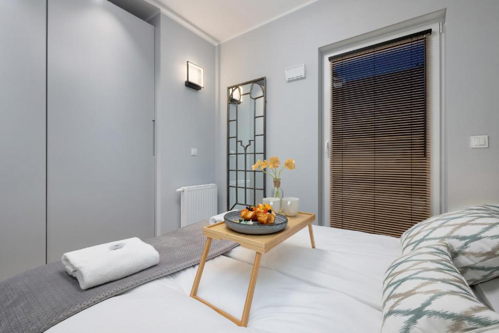 Posteľ alebo postele v izbe v ubytovaní Exclusive Apartments Mostowa by Renters Prestige