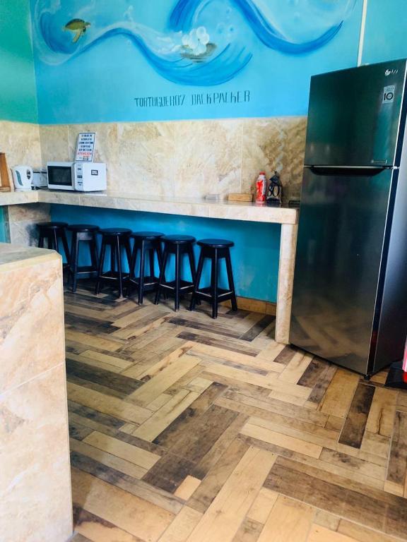 Kuchyň nebo kuchyňský kout v ubytování Hostel Tortuguero 7BackPackers