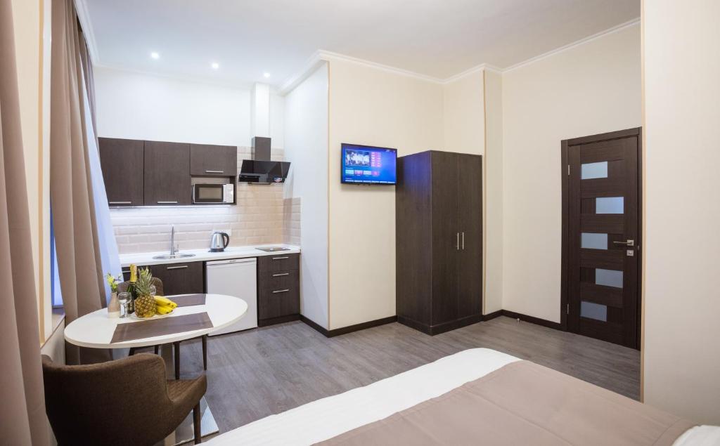 Kuchyň nebo kuchyňský kout v ubytování Khreshchatyk Apart Hotel Passage