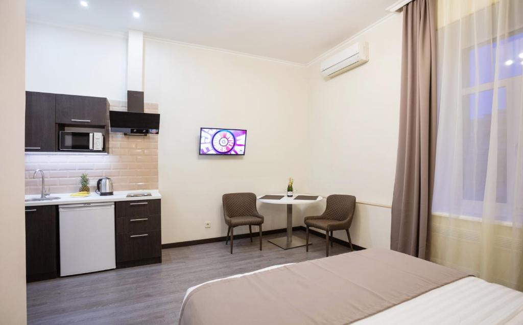 Kuchyň nebo kuchyňský kout v ubytování Khreshchatyk Apart Hotel Passage
