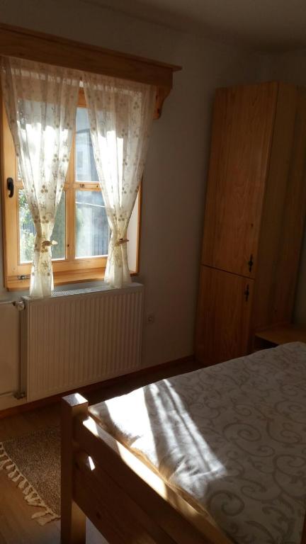 Postel nebo postele na pokoji v ubytování Rita Apartman & Studio
