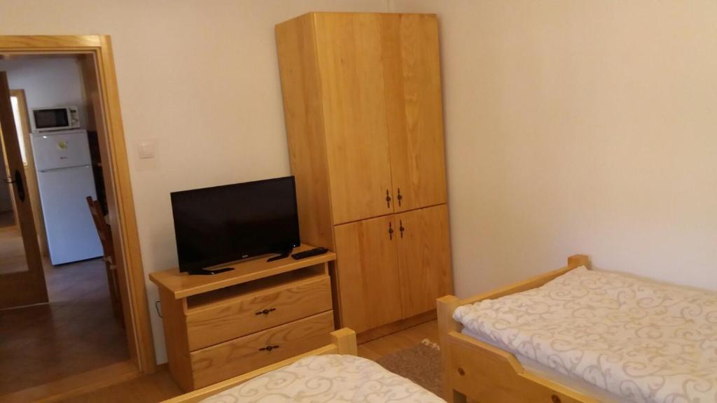 Postel nebo postele na pokoji v ubytování Rita Apartman & Studio