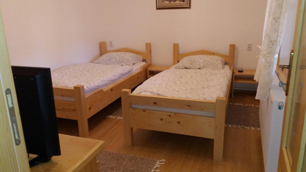 Postel nebo postele na pokoji v ubytování Rita Apartman & Studio