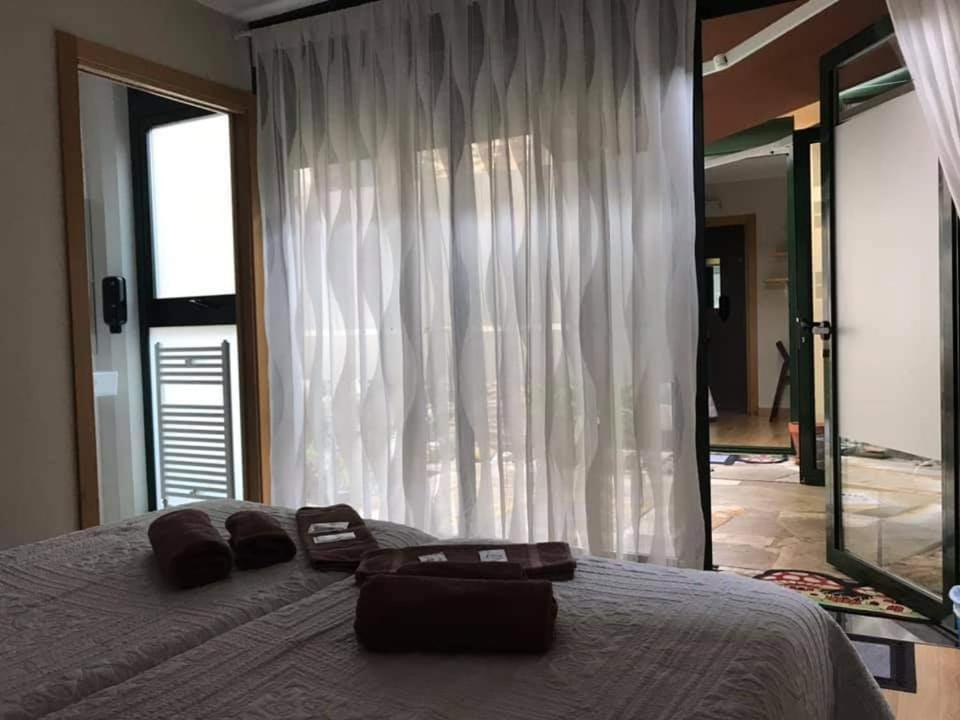 Łóżko lub łóżka w pokoju w obiekcie Pension Siete en el Camino