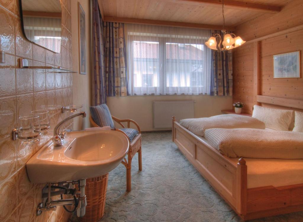 Postel nebo postele na pokoji v ubytování Haus Christl