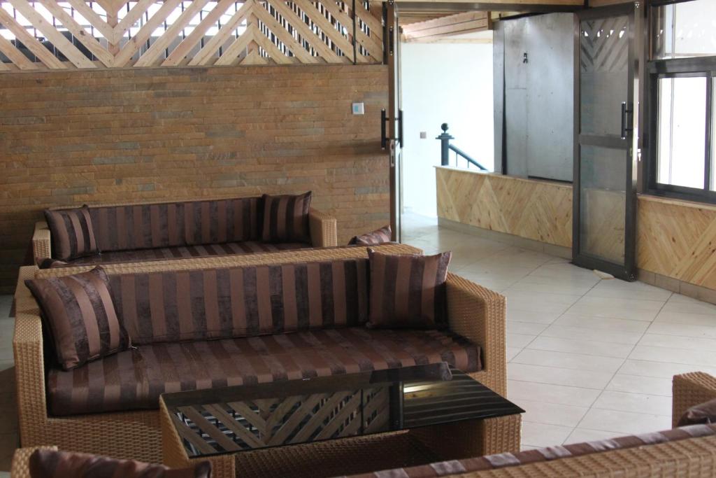 Posezení v ubytování Airport Landing Hotel