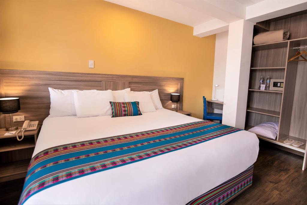 Postel nebo postele na pokoji v ubytování Atoq San Blas Hotel
