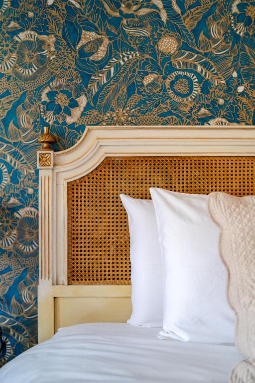 Postel nebo postele na pokoji v ubytování Hotel Boutique Casa Zevallos