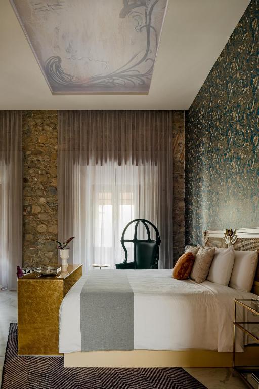 Postel nebo postele na pokoji v ubytování Hotel Boutique Casa Zevallos