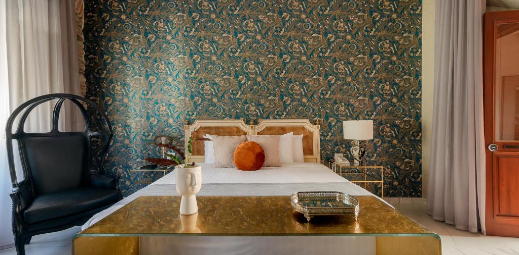 Postel nebo postele na pokoji v ubytování Hotel Boutique Casa Zevallos