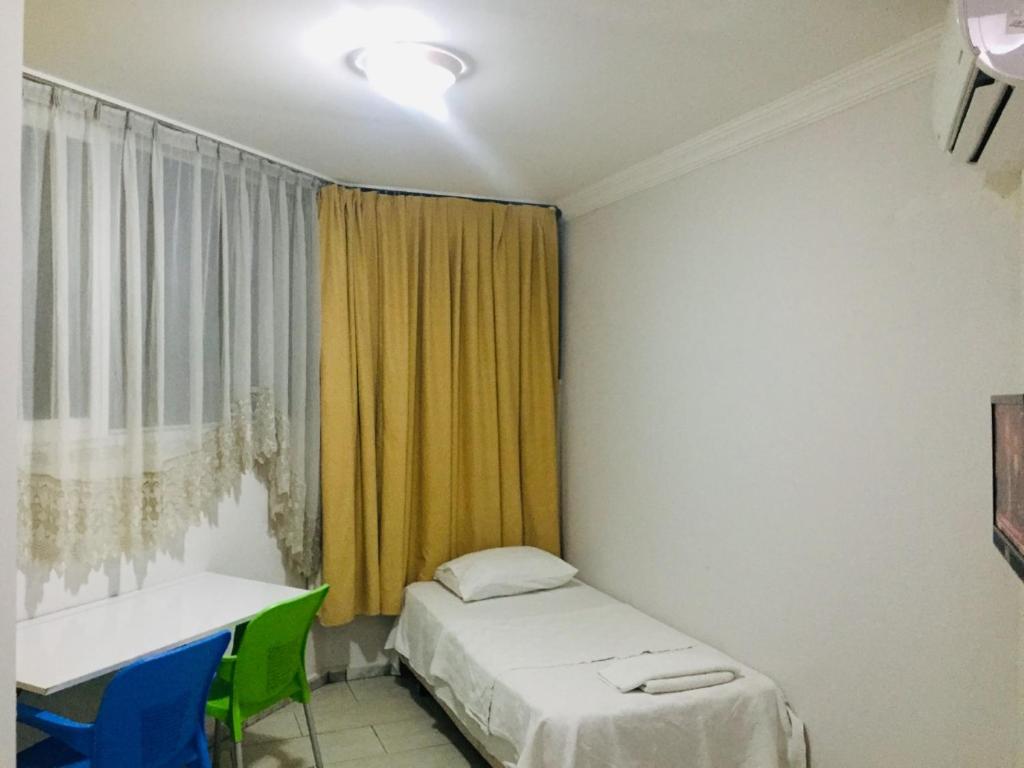 Postel nebo postele na pokoji v ubytování Şato Apart Hotel