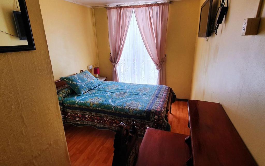 Postel nebo postele na pokoji v ubytování Hotel Iberia