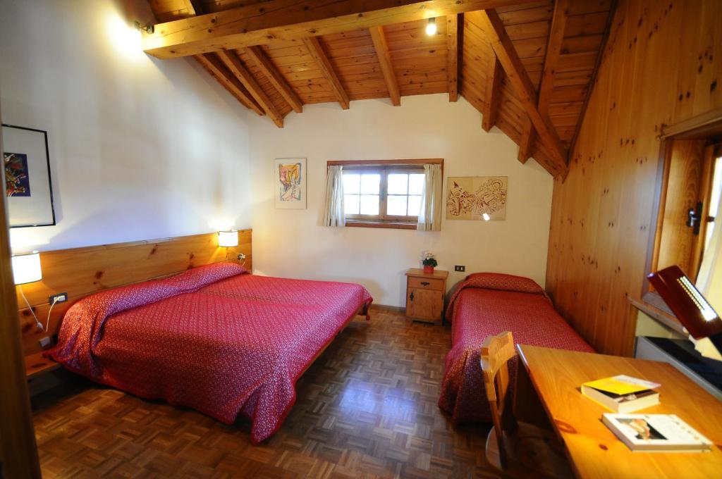 Letto o letti in una camera di Hotel 2 Camini