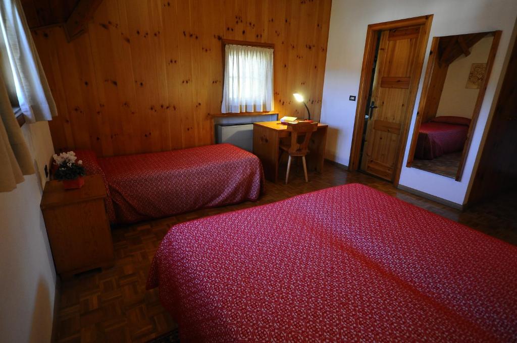 Letto o letti in una camera di Hotel 2 Camini