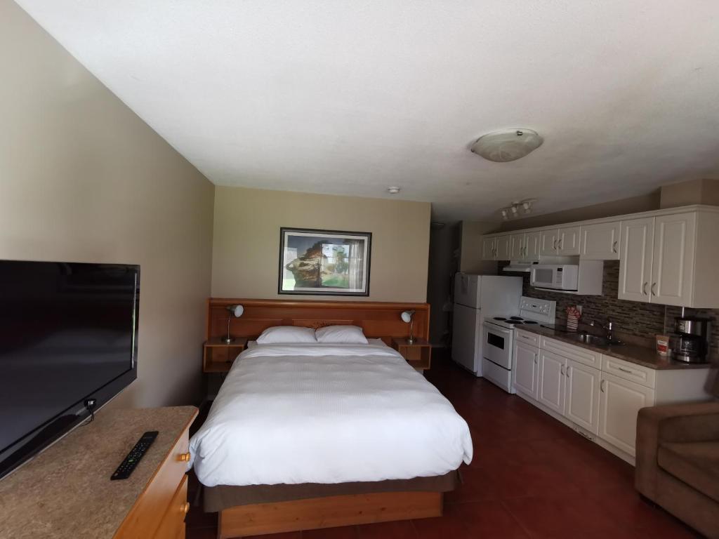 Kuchyň nebo kuchyňský kout v ubytování Sandy Beach Suites