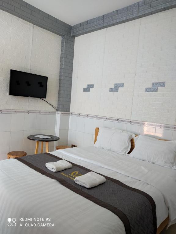 Katil atau katil-katil dalam bilik di Khách sạn Hoa Anh Anh