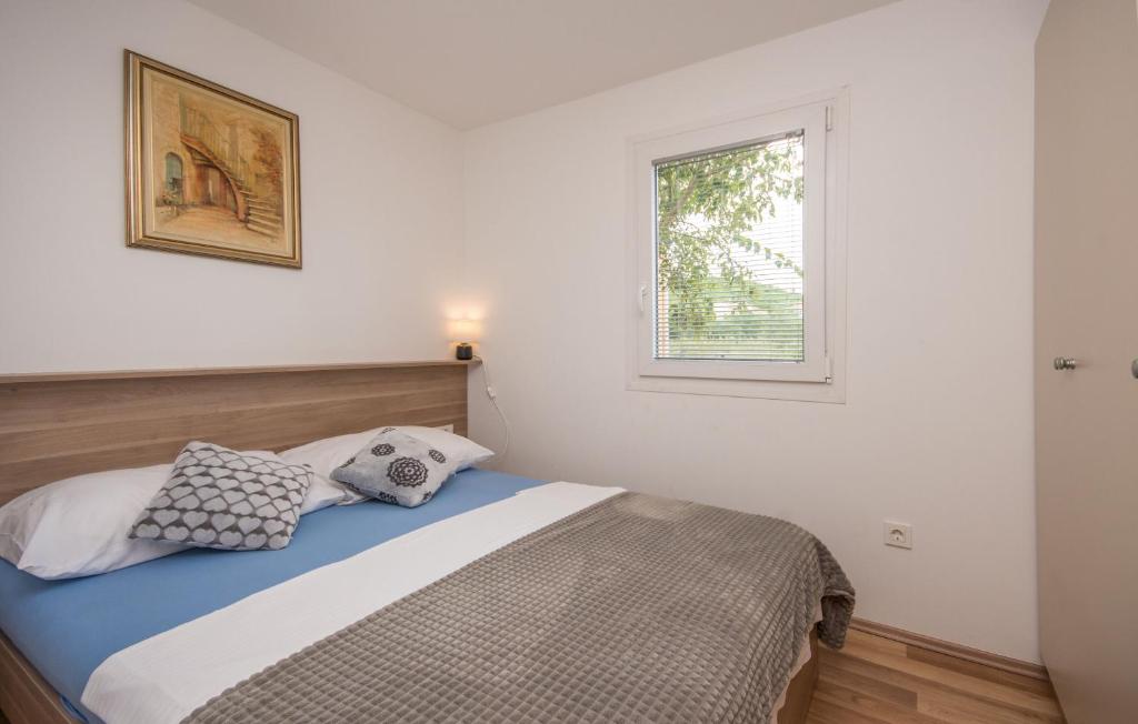 Postel nebo postele na pokoji v ubytování Mobile home Sea Bream