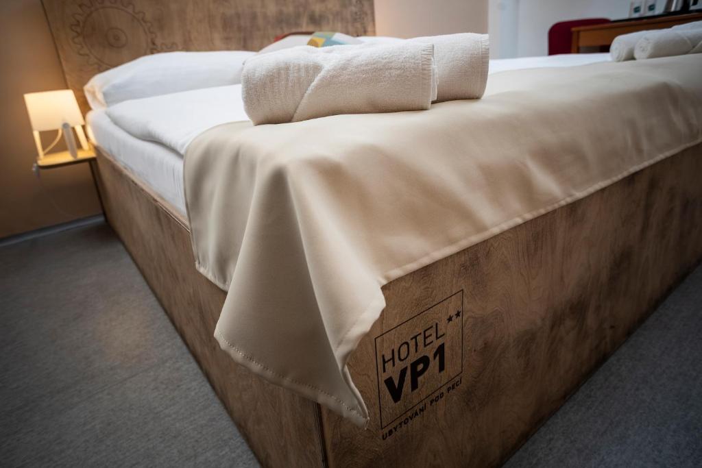 Postel nebo postele na pokoji v ubytování Hotel VP1