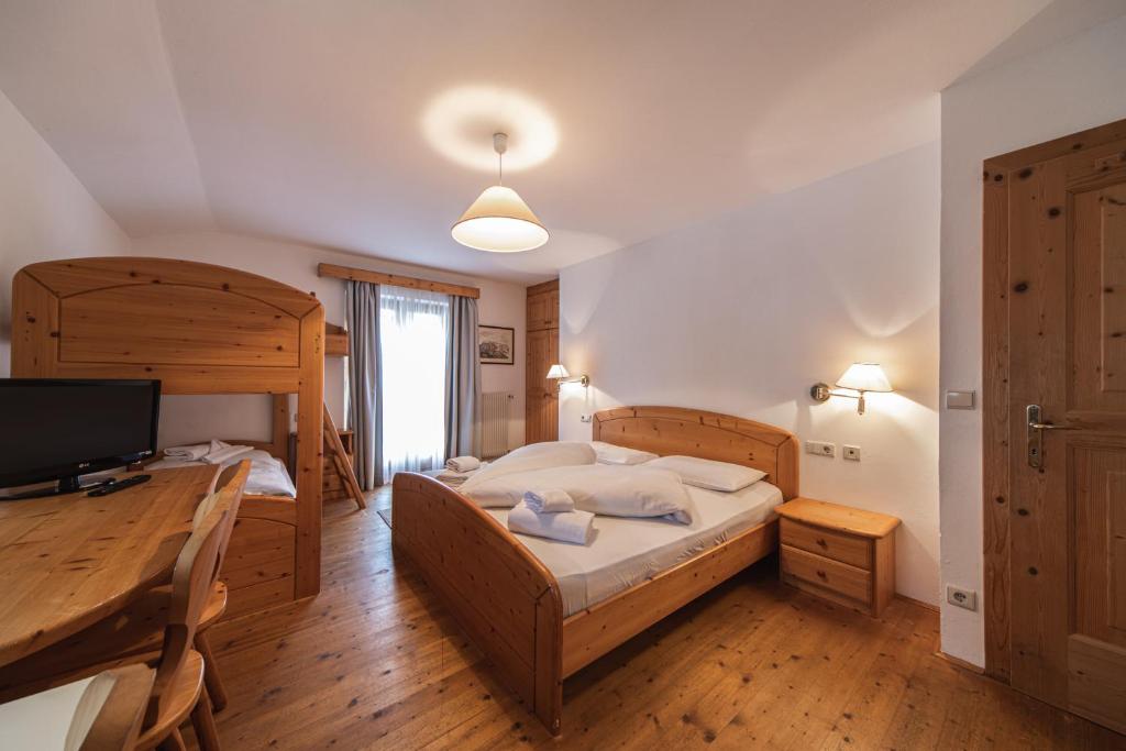 Postel nebo postele na pokoji v ubytování Hotel Fines