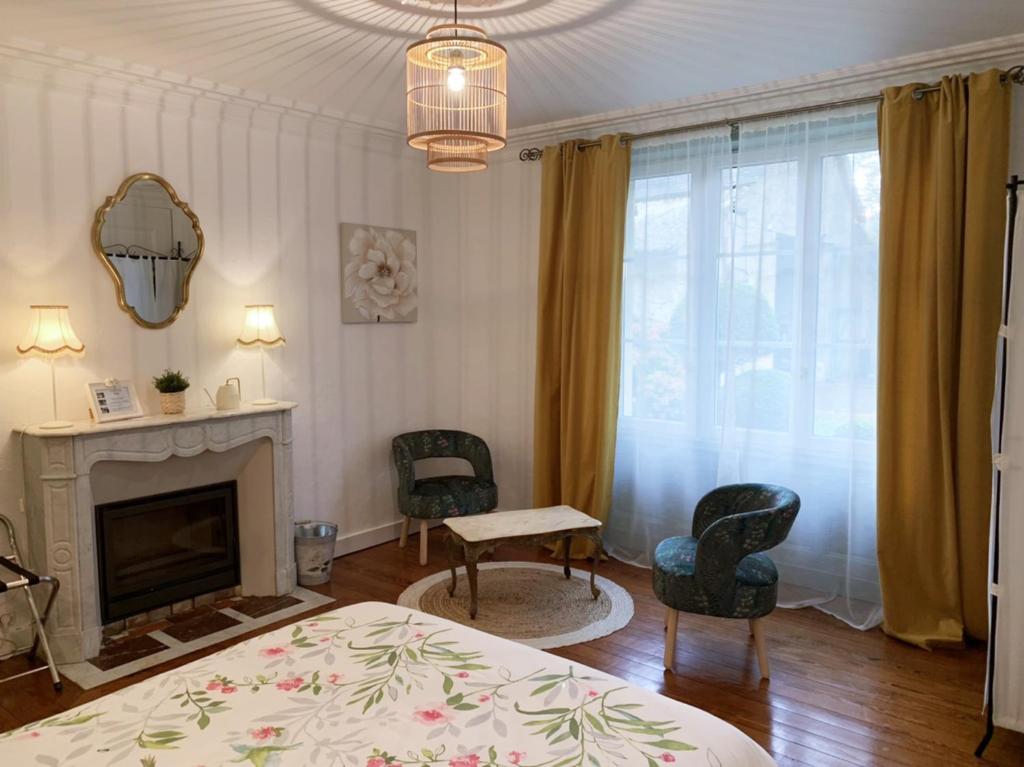 Postel nebo postele na pokoji v ubytování La Part des Anges