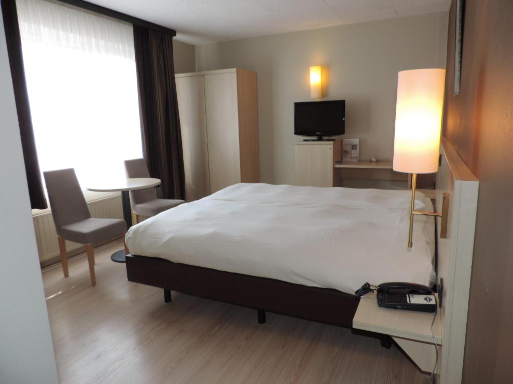 Voodi või voodid majutusasutuse Hotel Panorama toas