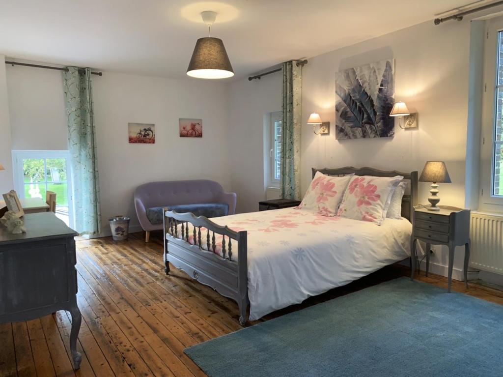 Postel nebo postele na pokoji v ubytování La Part des Anges