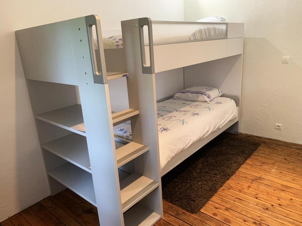 Postel nebo postele na pokoji v ubytování La Part des Anges