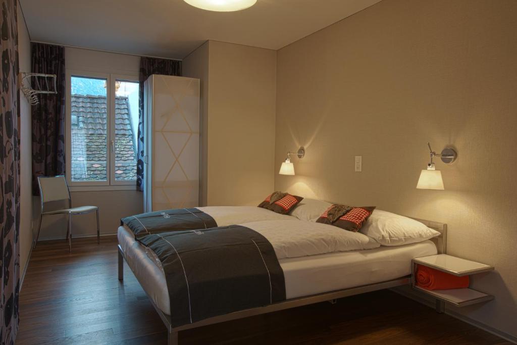 Postel nebo postele na pokoji v ubytování Boutique Hotel Bellevue