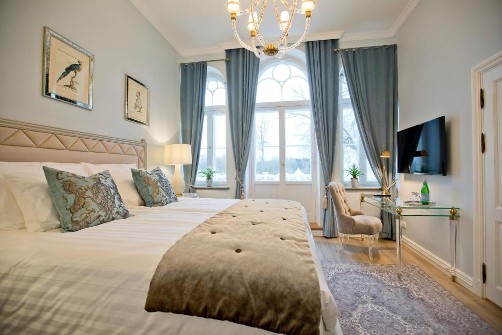 Postel nebo postele na pokoji v ubytování Schloss Fall, Keila-Joa