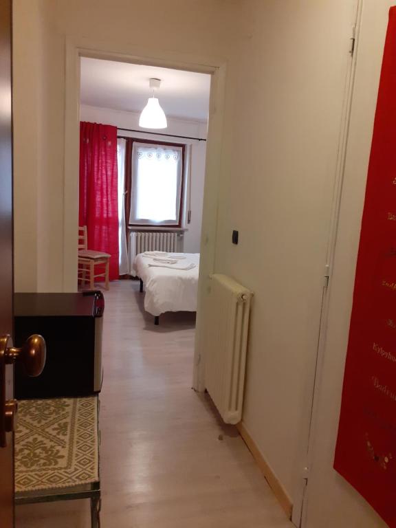 Posteľ alebo postele v izbe v ubytovaní La Casetta Del Dahu
