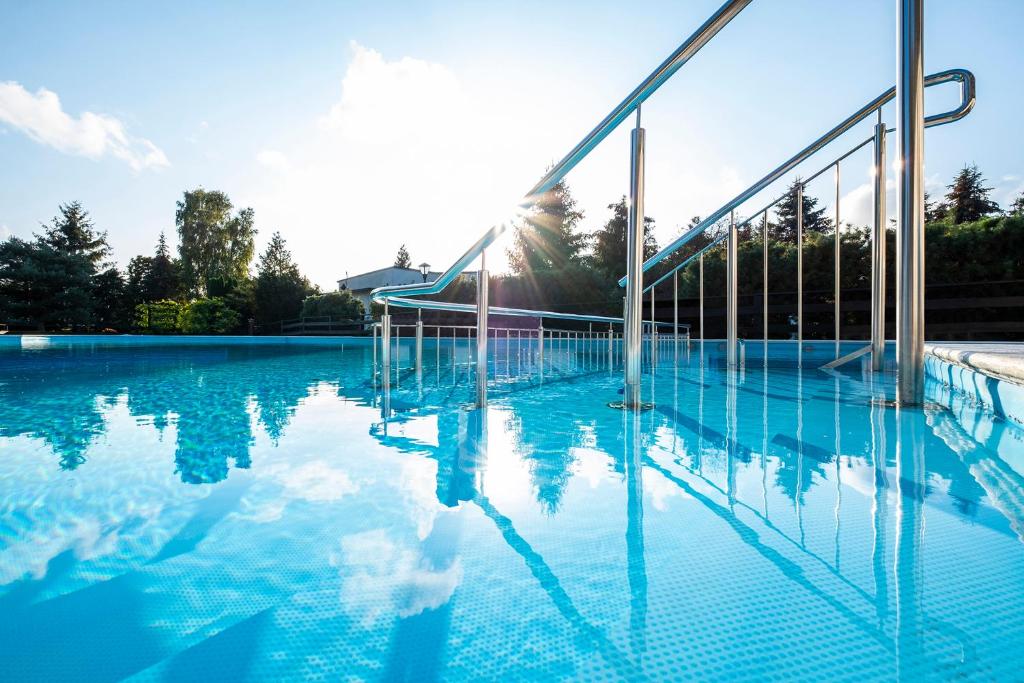 Bazén v ubytování Lech Resort & Spa nebo v jeho okolí