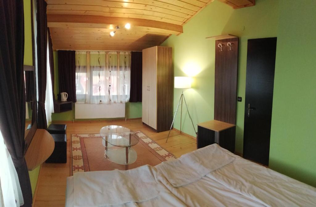 Postel nebo postele na pokoji v ubytování Apartments Black Horse