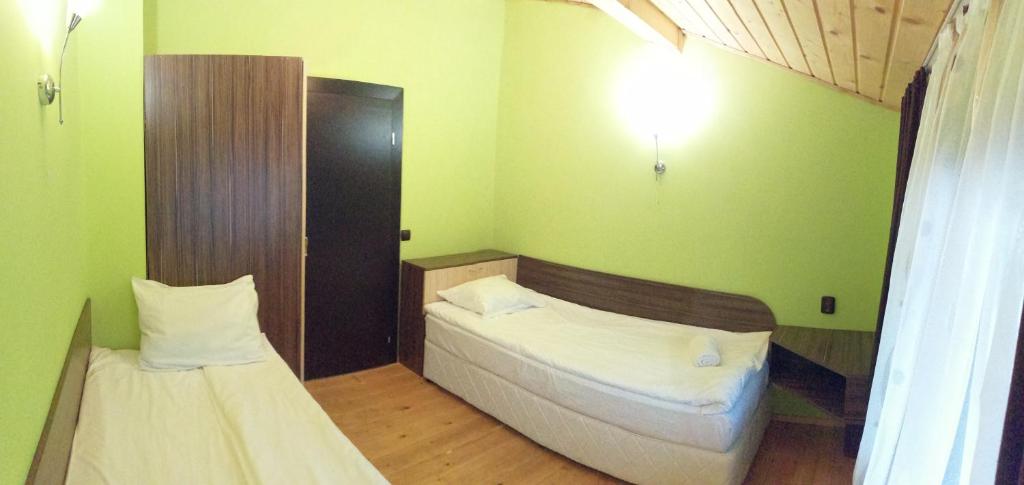 Postel nebo postele na pokoji v ubytování Apartments Black Horse