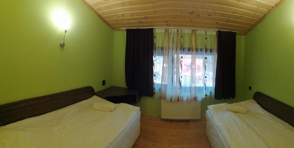 Postel nebo postele na pokoji v ubytování Apartments Black Horse
